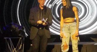 Guest called up on stage by magician in dallas show